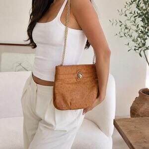 Tan leather handbag with chain